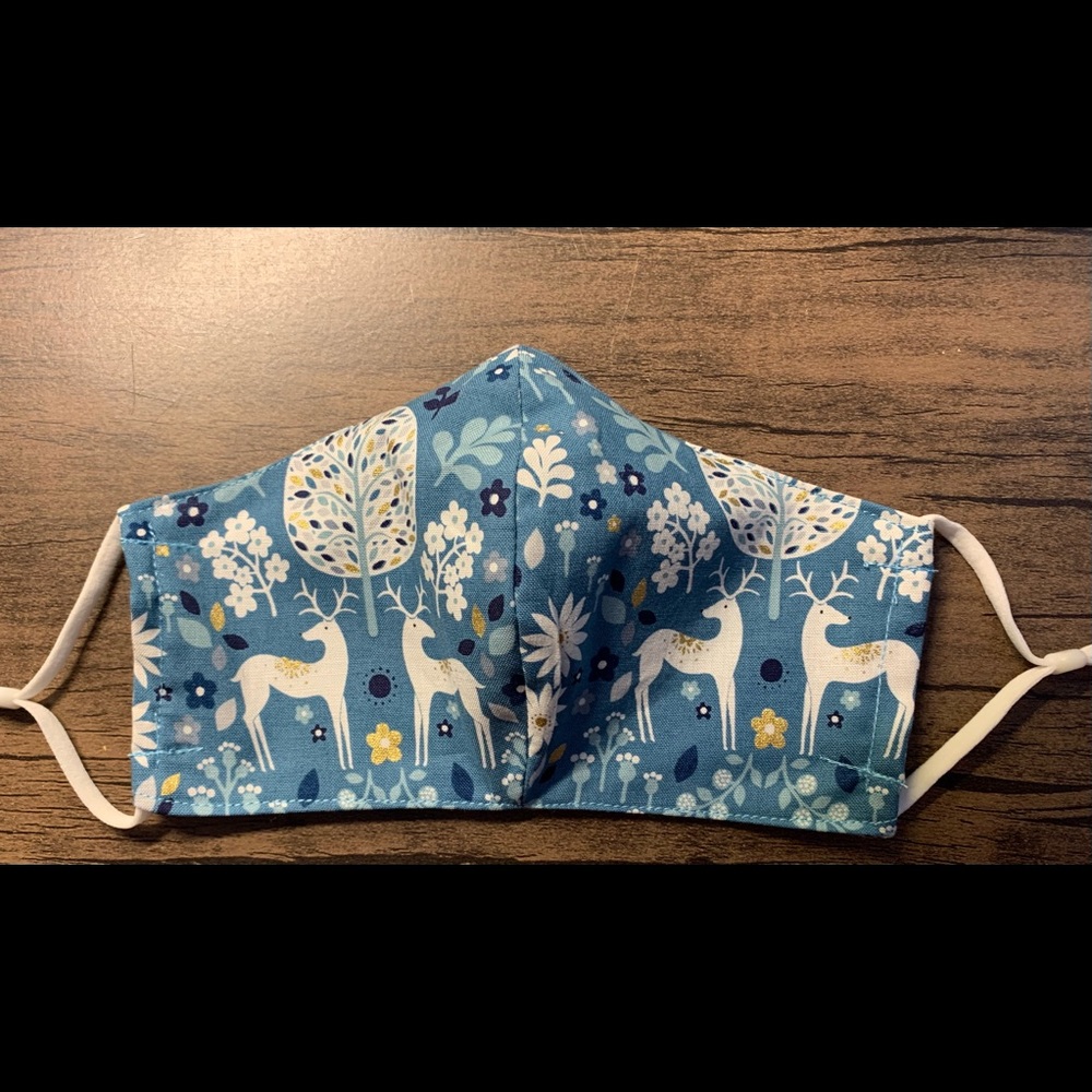 Fitted Fair Isle mask with filter pocket , nose wire , and adjustable ear loops